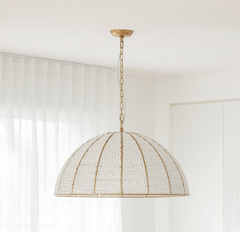 Gleaming gold beaded pendant light: a masterpiece of elegance & charm from Ivory & Deene