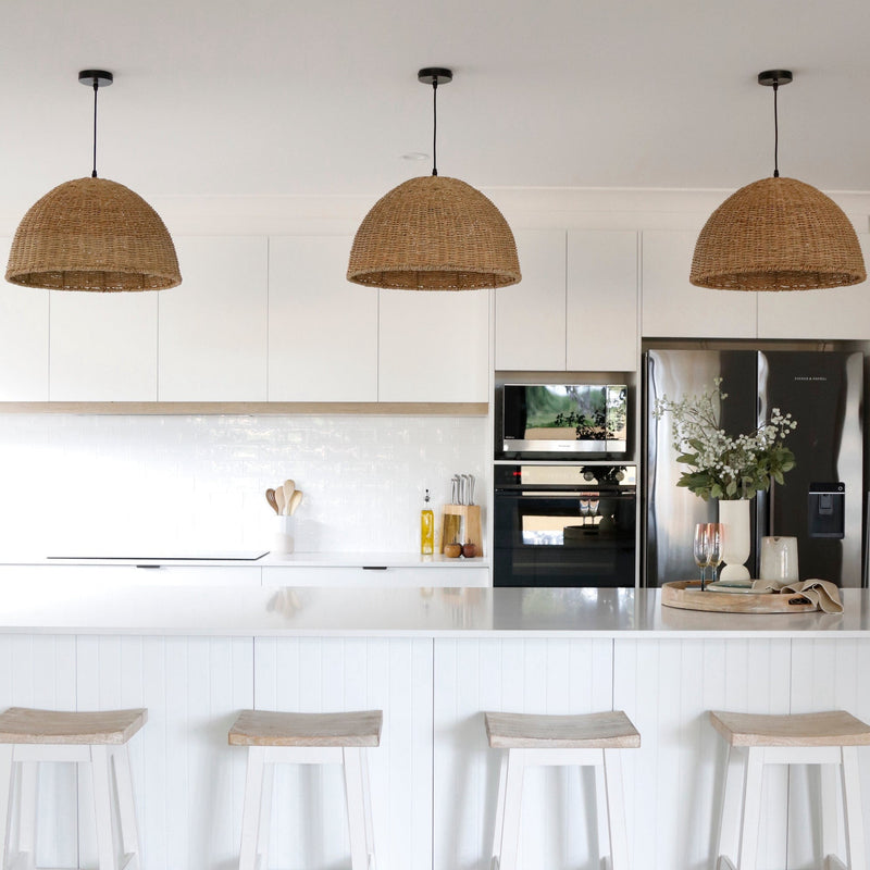 villa pendant light made with rope hanging in a white kitchen