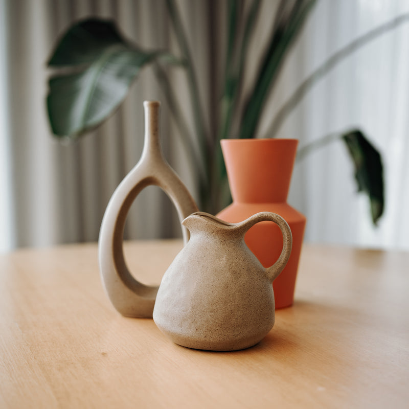 ceramic vases on a dining table