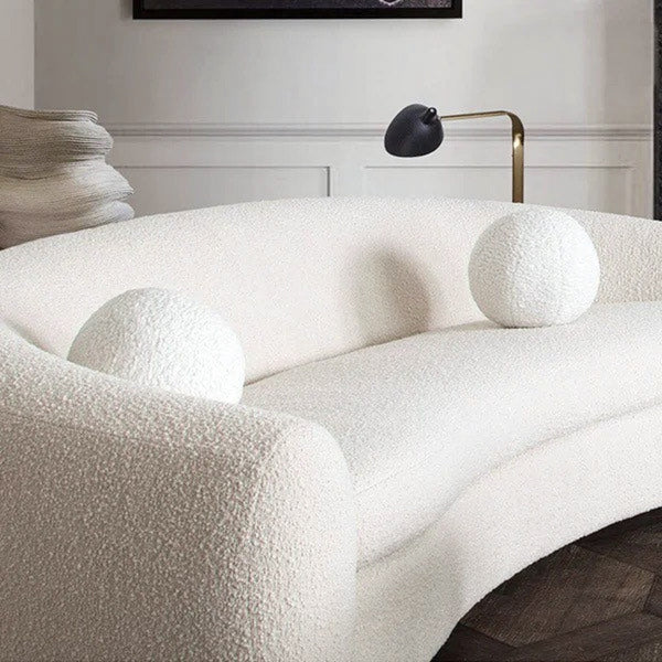 Chic round boucle ball cushion in a plush design, adding a touch of elegance to any room decor