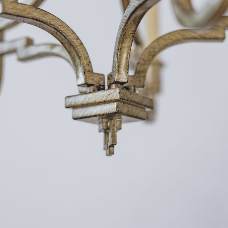 Bottom detail of modern Kalani chandelier in brushed gold. 