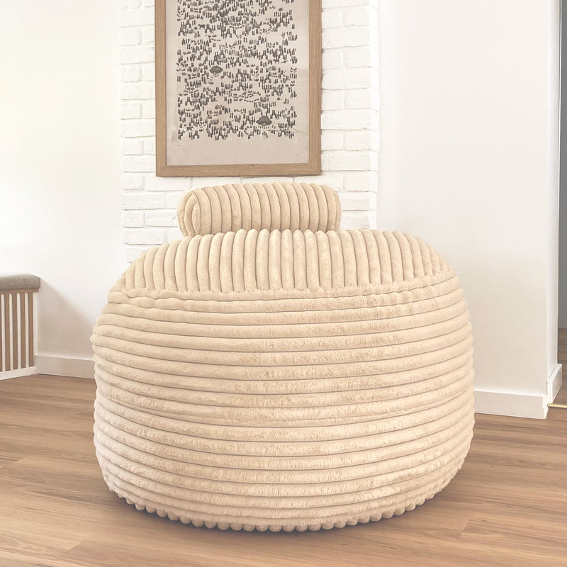 Large faux fur beanbag chair in a cozy living room setting  Edit alt text