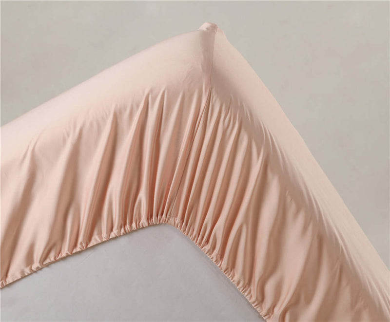fitted sheet in soft coral pink from Ivory and Deene