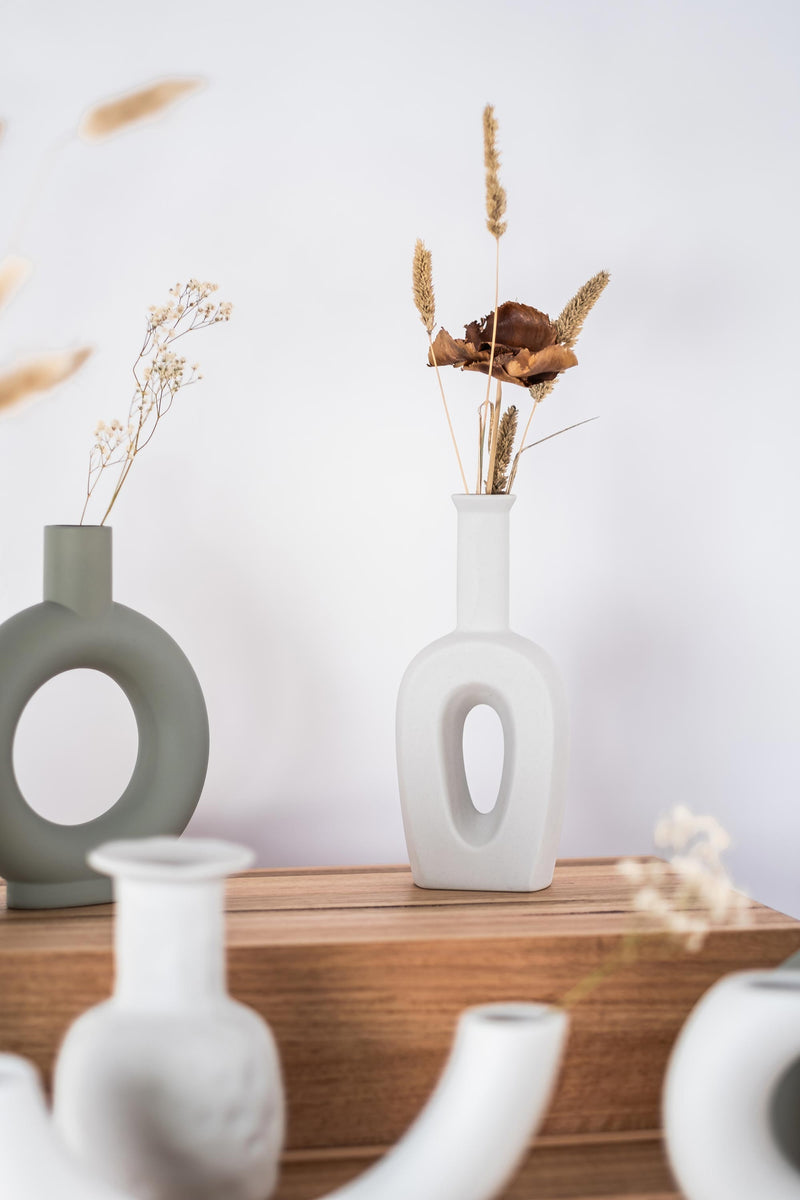 home decor modern ceramic vase on a wooden shelf