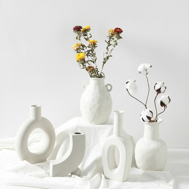 home decor modern ceramic vases on a white shelf