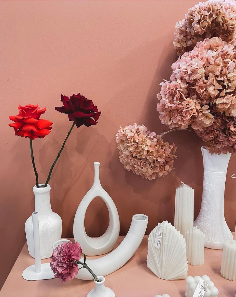 home decor modern ceramic vases on a wooden shelf