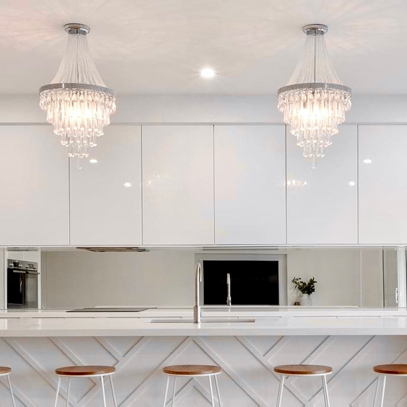 olivia pendant chandelier hanging in a modern white kitchen