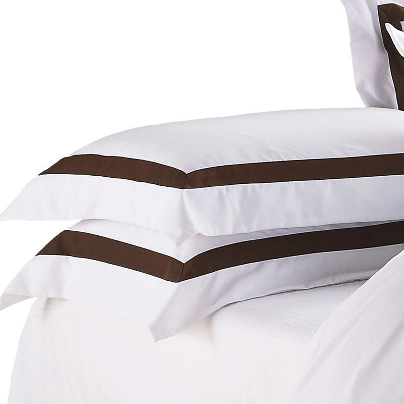 luxury white bedding with contrast border trim