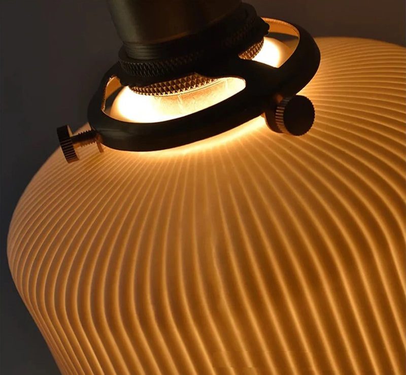 white pleated pendant light with gold hardware