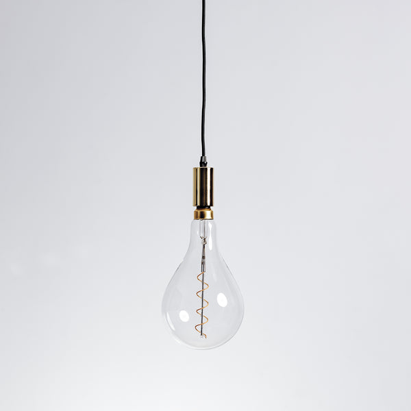 Contemporary pendant light fixture with polished gold finish hanging from ceiling.