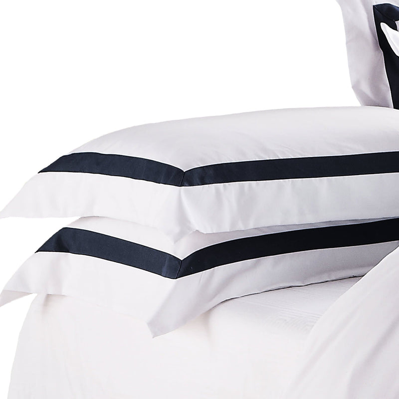 set of two white pillowcases with black trim