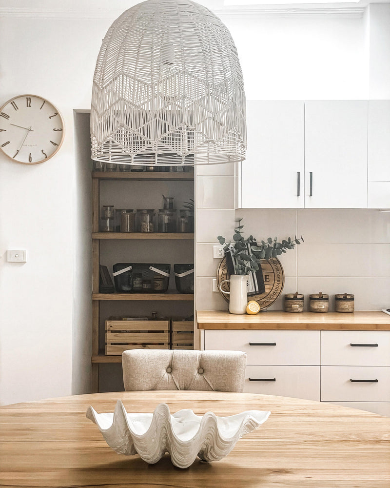 white rattan lace pendant light in a modern organic kitchen