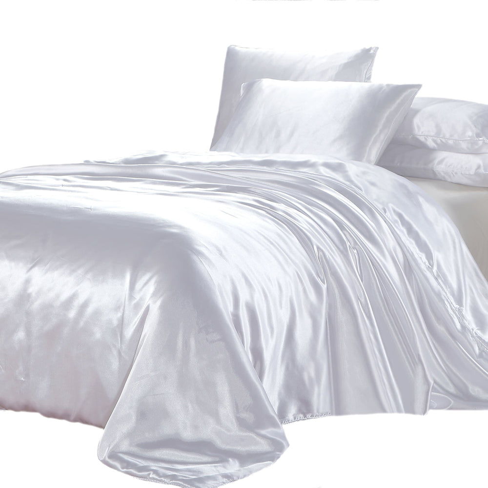 satin quilt cover white with pillows on a white background